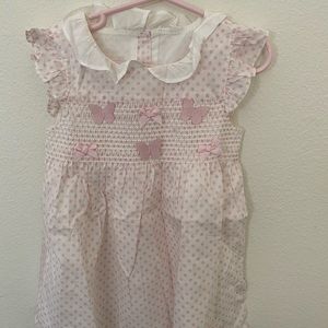 pink dotty dress with butterfly details